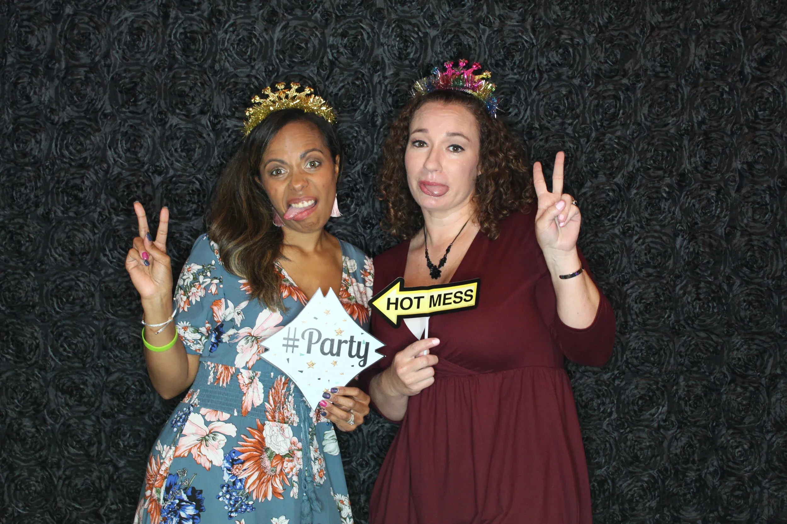 Guests posing with festive props