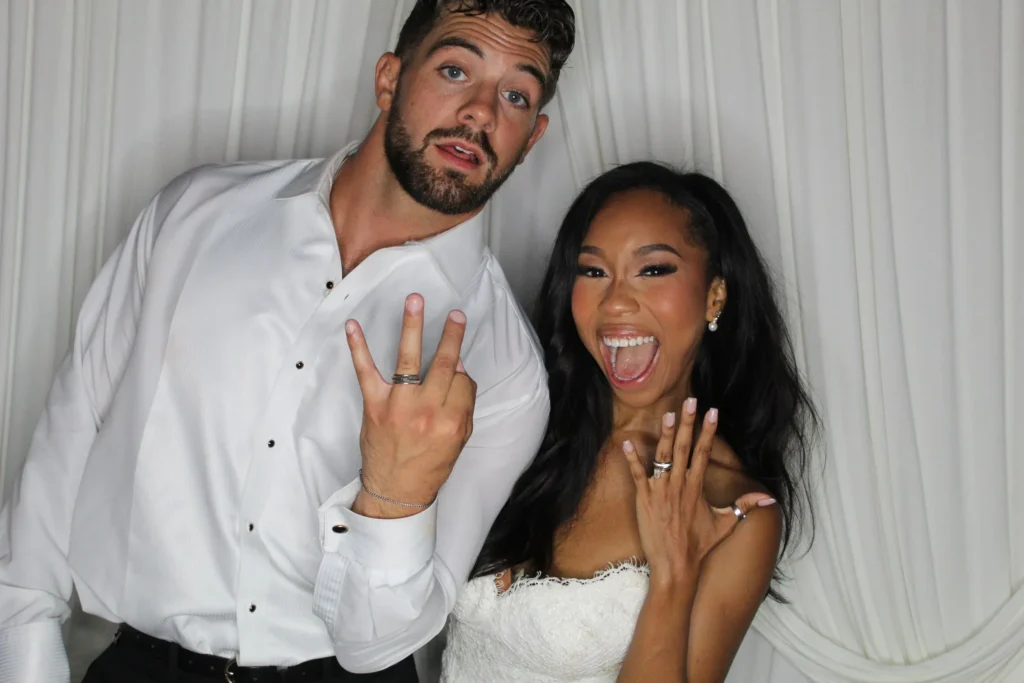 Couple posing at their wedding reception